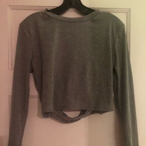 Sweater with crisscross back out.